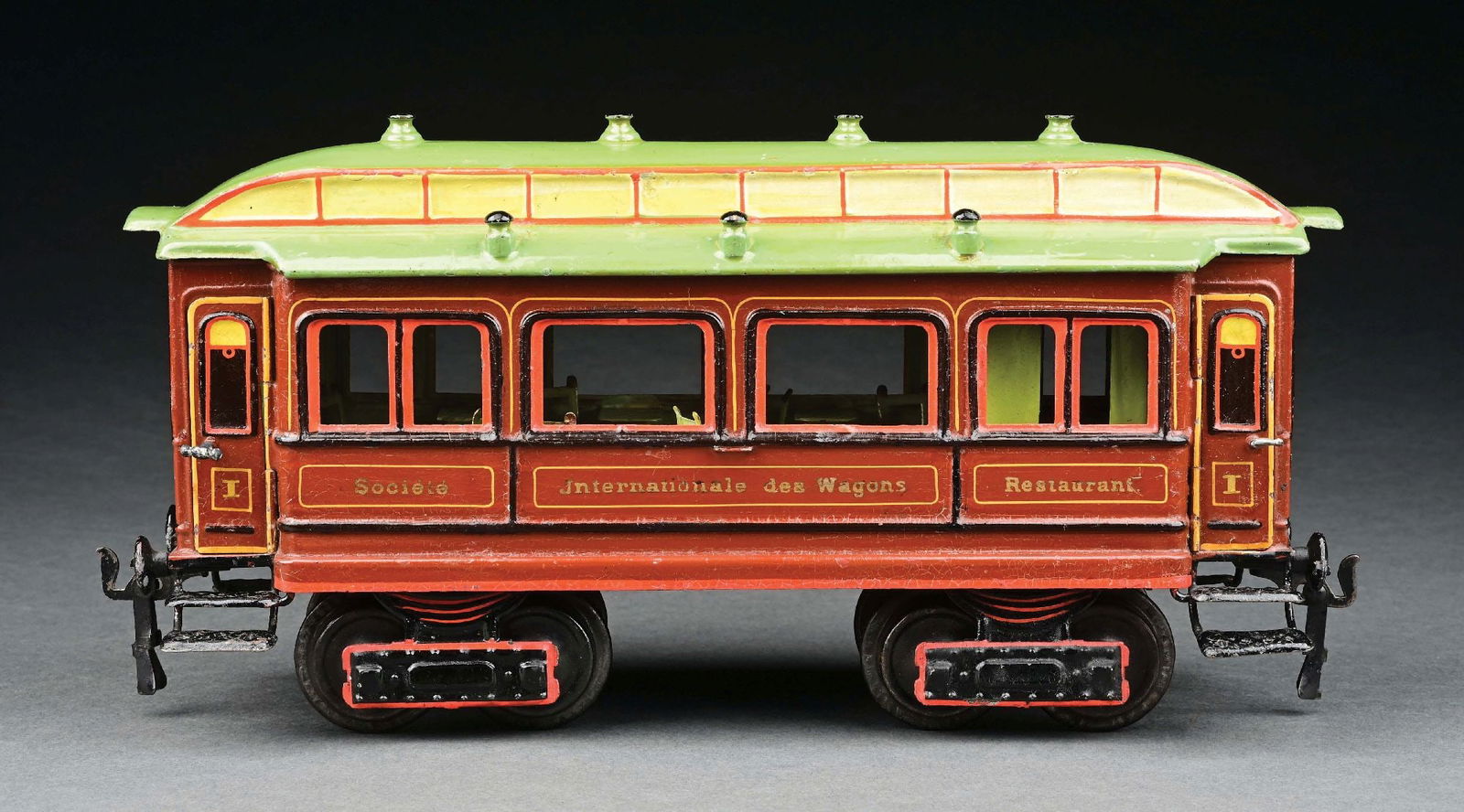 MARKLIN I GA. HAND-PAINTED DINING CAR WITH FRENCH INSCRIPTIONS: CONDITION: Overall appearance is near mint, but has a few touch-ups, making the grade excellent. Item Dimensions: 12" x 3 - 1/2" x 5 - 1/2".