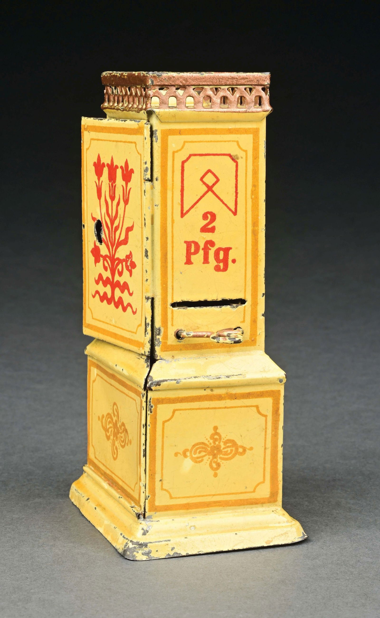 MARKLIN CAT. REF. 2196 HAND-PAINTED AUTOMATIC TICKET DISPENSER IN YELLOW: C. 1904-1908. CONDITION: Excellent. Item Dimensions: 3" x 2 - 1/4" x 5 - 5/8".