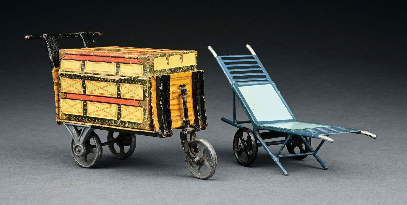 LOT OF 2: MARKLIN LUGGAGE CARTS: CONDITION: Excellent-near mint. Including one paper litho trunk. Item Dimensions: Largest: 5" x 2 - 1/4" x 4".
