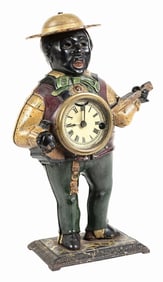 BLACK MAN W/ BANJO BLINKING EYE CLOCK