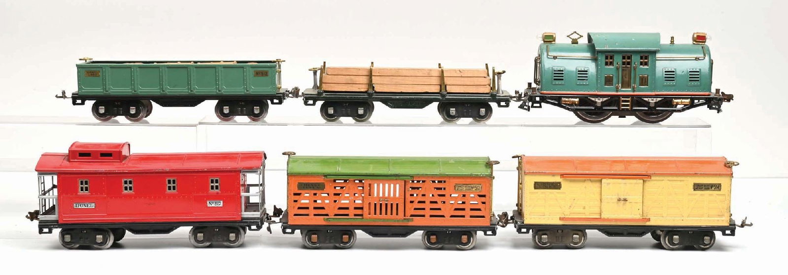 LIONEL OUTFIT NO. 354 IN BOX: Lionel Outfit No. 354 in box: No. 10 Electric Outline Locomotive, Peacock with orange stripe, complete and all original, some touch-up on the cab roof, some scratches and paint chips, very good condit