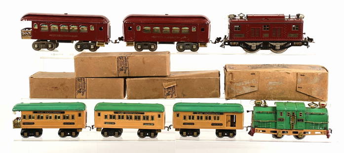 LOT OF 7: LIONEL NO. 8 SET & AMERICAN FLYER POCHONTAS SET: (1) A Lionel No. 8 set: (A) A maroon No. 8, early version with strap headlights and combo couplers, excellent condition. It is complete and all original, except it has been re-wheeled, which is common