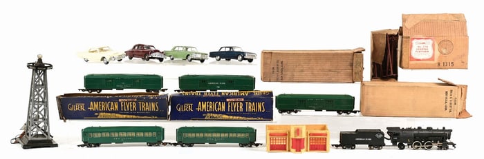 LARGE LOT OF FREIGHT CARS, TOWER, AND TOY CARS