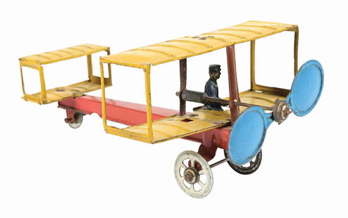 GERMAN TIN LITHO PENNY TOY AIRPLANE: Bi-wing. CONDITION: Original propeller and driver. Condition: (Very Good - Excellent). Dimensions: 5 - 1/4" x 3 - 1/2" x 2 - 1/4".