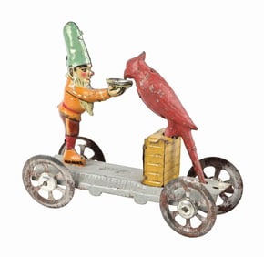 GERMAN TIN LITHO DWARF FEEDING PARROT PENNY TOY