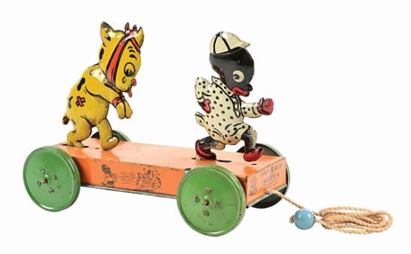 NIFTY SNOWFLAKES AND SWIPES ANIMATED TIN LITHO FLOOR TOY