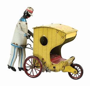 GERMAN TIN LITHO WIND-UP MAN PUSHING ROLLO-CHAIR