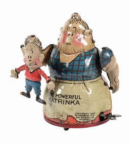 GERMAN TIN LITHO POWERFUL KATRINKA TIN WIND-UP TOY