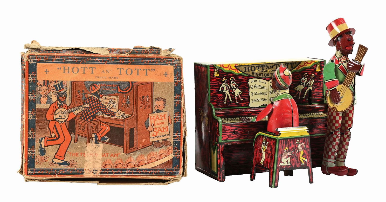 UNIQUE ART TIN LITHO WIND-UP HOTT AN TOTT WIND-UP BAND TOY: Has "Hott 'An' Tott / Right on the Spot" label on piano. CONDITION: Comes with scarce original box, which looks complete. The top flap is detached, but present. All original arms and banjo. Piano play