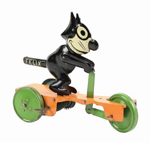 CHEIN FELIX THE CAT TIN LITHO WIND-UP SCOOTER TOY