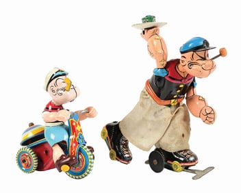 LOT OF 2: LINEMAR TIN LITHO & CELLULOID WIND-UP POPEYE TOYS