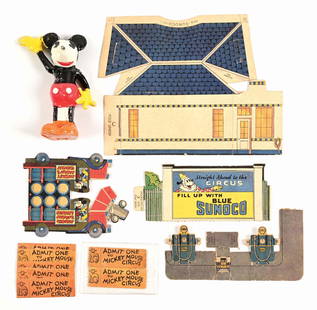GROUPING OF LIONEL MICKEY MOUSE CIRCUS TRAIN ACCESSORIES: Includes: composition Mickey the Barker, five original tickets, cardboard Mickey Mouse Circus Truck and Sunoco Station with sign and pumps. Condition: (Very Good - Excellent). Dimensions: 5" x 4"