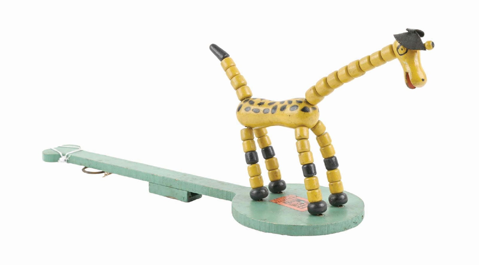VERY SCARCE FISHER PRICE GIRAFFE ON PADDLE TOY: Pre-war. Nice Fisher Price Pop-Up Kritter decal, patented 1926. Giraffe is jointed. CONDITION: Missing one ear. Condition: (Very Good - Excellent). Dimensions: 12 - 3/4" x 4".