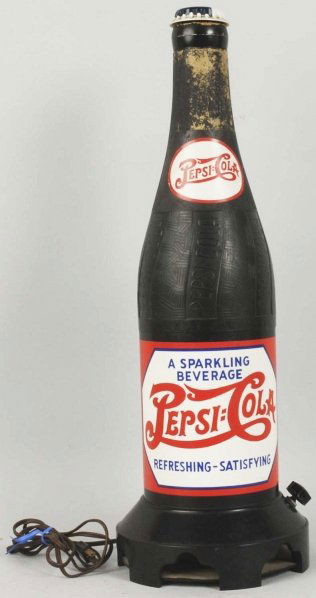 1940s Pepsi-Cola Bottle Radio.: Paper reproduction labels have replaced the old decals. Paint loss at neck and light wear or soiling otherwise. Condition (Excellent). Size 23 - 1/2" T.