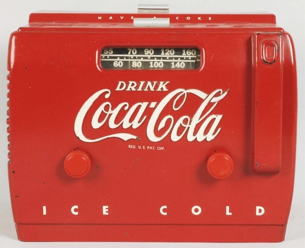 1950s Coca-Cola Cooler Radio.: Nice display example with a few tiny body nicks and small paint chips; otherwise, only light wear or soiling. Condition (Very Good - Excellent). Size 12" x 9 - 1/2".