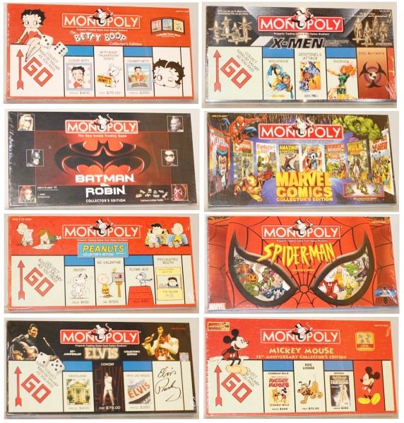 Lot of 8: Assorted Monopoly Games in Boxes.: Includes one Elvis Monopoly, one Betty Boop Monopoly, one Spiderman Monopoly, and several other character Monopoly games. Condition (Near Mint). Size Largest Box: 20" x 10".