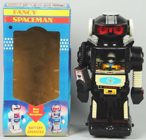 Battery-Operated Fancy Space Man Toy Robot.: Made in Taiwan. Very unusual toy that depicts a man that drives a robot. Old store stock. Includes original box marked "With intensity sound and microphone". Box has some overall wear. Condition (Near