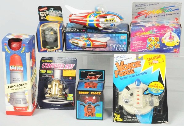 Lot of 7: Space & Robot Related Toy Items.: Various companies include Mattel, Toy Island, and others. Old store stock. Includes all original boxes or original cards. Some edge wear and creasing to boxes and cards. Condition (Excellent - Near Mi