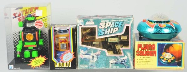 Lot of 4: Space & Robot Toys.: Made in various countries including Japan and Hong Kong. Includes one Saturn Robot, one Mystery Bump 'n Go Robot, one Flying Saucer, and one Transfour-Motion Spaceship made by Shaider. Old store stock