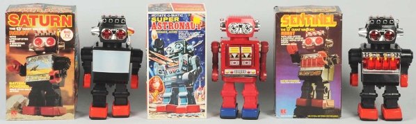 Lot of 3: Battery-Operated Robot Toys.: Made in Hong Kong and Taiwan. Includes one Sentinel Giant Walking Robot with missiles, one Super Astronaut, and one Saturn Robot. Old store stock. Includes all original boxes with some creasing and we