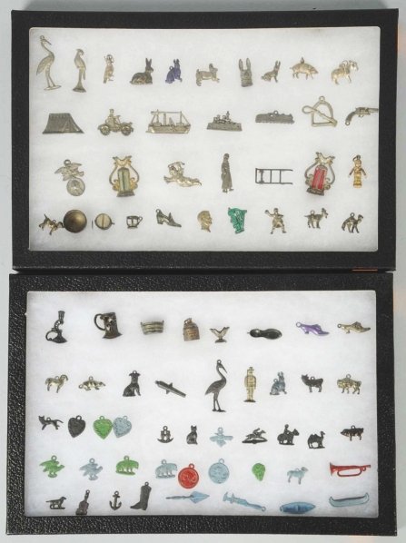 Lot of 75+ Metal Cracker Jack Toys & Charms.: This lot includes ships, animals, cars, and many others. Condition (Excellent). Size Largest: 1 - 1/2" L.