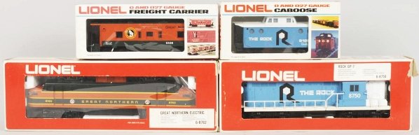 Lot of 4: Lionel Train Engines & Cabooses.: Contemporary. Includes no. 8750 GP-7 powered unit with matching no. 9180 tender. Also includes no. 8762 Great Northern engine with matching no. 6438 tender. Includes all original boxes with some teari