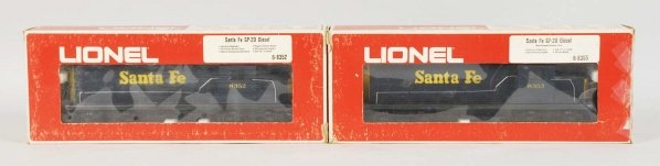 Lot of 2: Lionel Santa Fe GP Diesel Engines.: Includes one power unit and one dummy, both are numbered "8352". Includes original boxes with some wear. Condition (Very Good - Excellent).