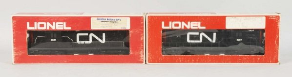 Lot of 2: Lionel Canadian National Train Engines.: Contemporary. Includes no. 8258 power unit no. 8031 dummy unit. Includes original boxes with some wear. Condition (Very Good - Excellent).