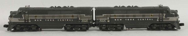 Lot of 2: Lionel New York Central Train Engines.: Post-war. Diesel type train engines. Matching no. 2344 A and B units. Decals have some cracking and B unit has significant wear on back end. Battery box appears to be fairly clean. Condition (Very Goo