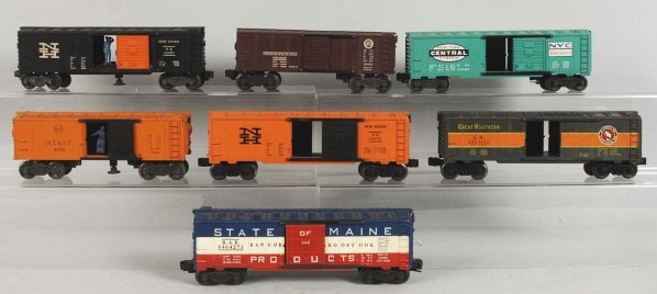 Lot of 7: Lionel Post-War Boxcars.: Includes New Haven, Great Northern, State of Maine, and others. Various conditions. Condition (Very Good).