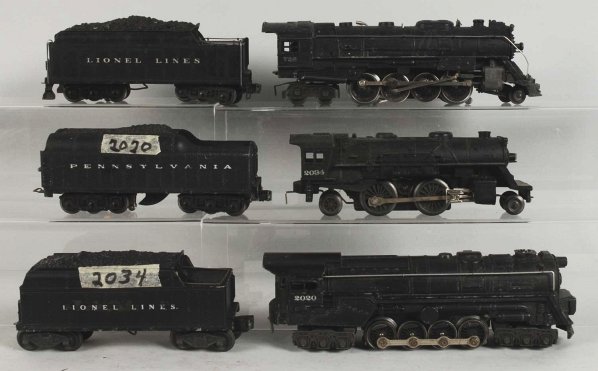 Lot of 3: Lionel Post-War Train Engines & Tenders: Includes no. 726, no. 2020, and no. 2034 with matching tenders. Includes an original box for the no. 2034 locomotive that has some overall creasing. Various conditions. Condition (Very Good).