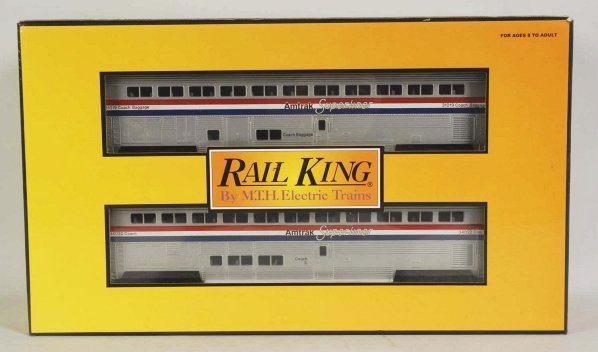MTH Rail King Amtrak Train Car Set.: Contemporary. Includes four Superliner cars. Includes original box. Condition (Near Mint).