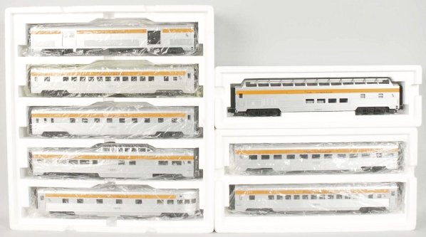 Lot of 3: MTH Passenger Train Car Sets.: Contemporary. Chessie System. Includes one five-car set, one two-car sleeper/diner set, and one Vista Dome passenger car. Includes all original boxes. Condition (Excellent - Near Mint).