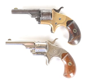 (A) LOT OF 2 COLT OPEN TOP POCKET MODEL SINGLE ACTION REVOLVERS.