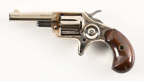 (A) SECOND MODEL COLT NEW LINE SINGLE ACTION REVOLVER (1876).