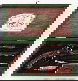 (A) CAYWOOD GUNMAKERS FLINTLOCK TARGET PISTOL.
