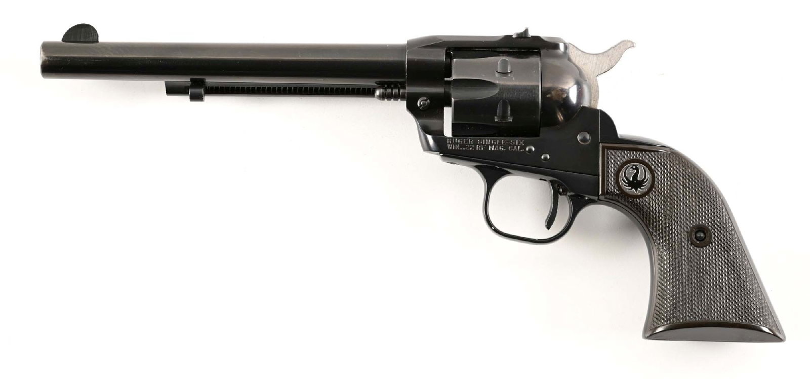 (C) EARLY RUGER SINGLE SIX .22 WINCHESTER MAGNUM SINGLE ACTION REVOLVER (1960): Made in 1960. Features blue finish, wind drift rear sight, checkered black grips with Ruger medallions. CONDITION: Excellent. Retains 97% blue with some muzzle wear and at tip of housing. Action and b