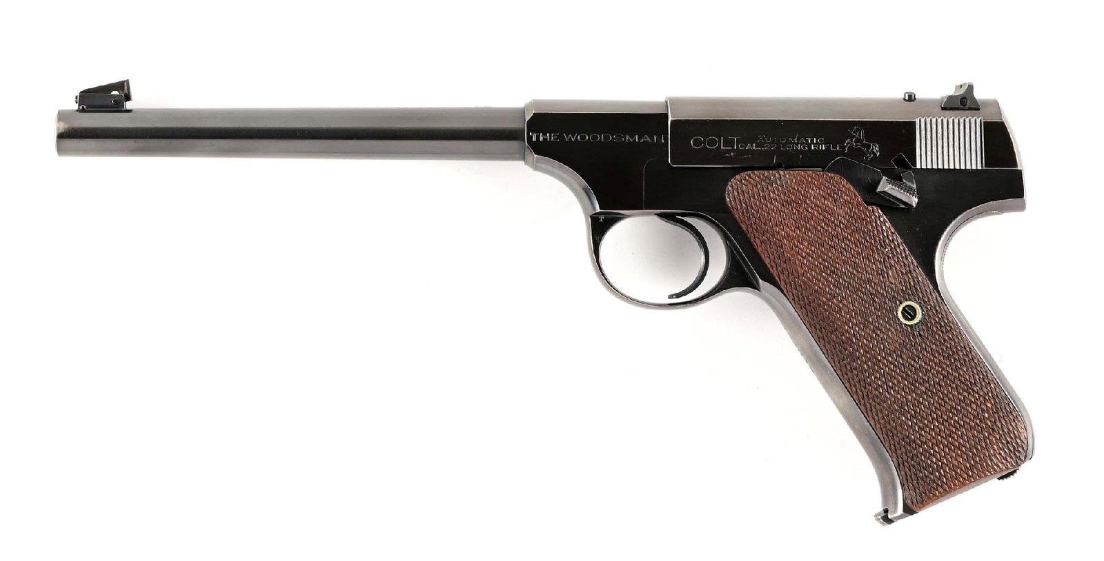 (C) PRE-WAR COLT WOODSMAN TARGET MODEL SEMI-AUTOMATIC PISTOL.: MFG. 1941. Standard target model. Blue finish, target front and rear, checkered walnut stocks with one Woodsman marked magazine. CONDITION. Excellent. There is a bit of wear at muzzle, some scattered 