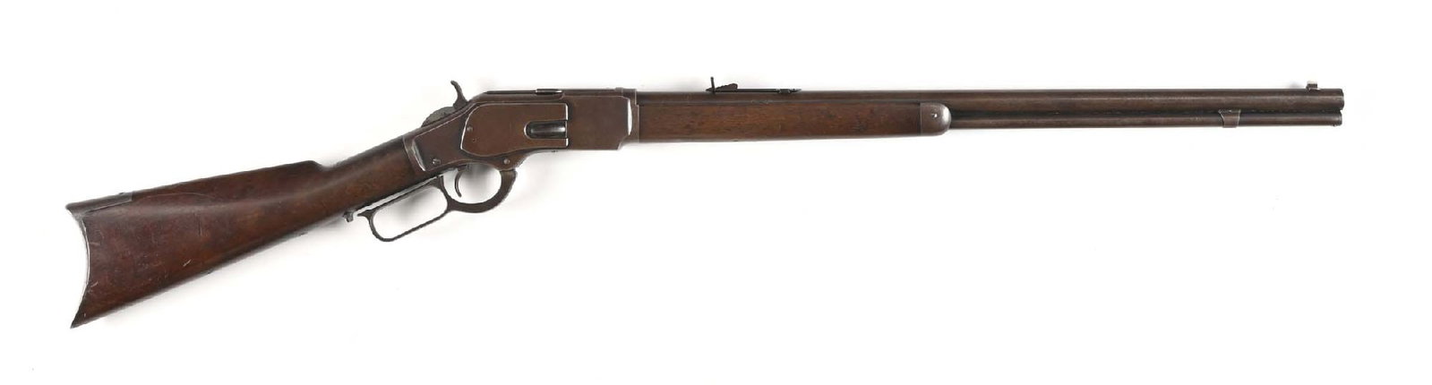 (A) WINCHESTER MODEL 1873 LEVER ACTION RIFLE (1884).: Manufactured in 1884. Features a full round barrel, full length magazine tube, German silver front sight, semi-buckhorn rear sight, blue finish, and walnut stock with rifle buttplate and matching fore