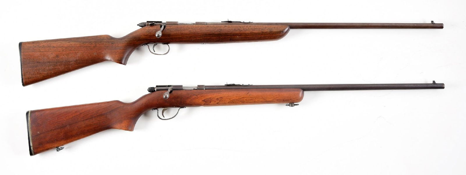 (C) LOT OF 2: REMINGTON MODEL 510 AND 514 BOLT ACTION RIFLES.: Lot consists of: (A) Single shot bolt action Remington 510 Targetmaster with blued finish, sporting sights, 1-piece smooth walnut stock, and checkered Remington composition butt plate. CONDITION: Fair
