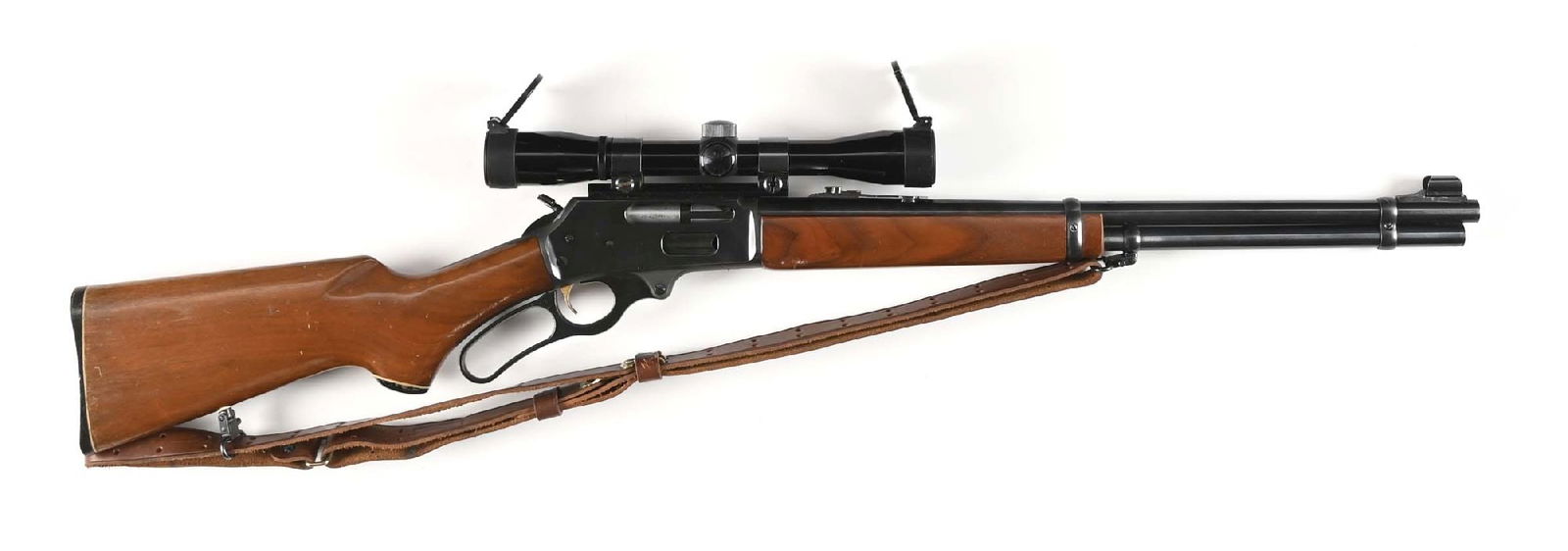 (M) MARLIN 336 LEVER ACTION SPORTING RIFLE.: Features include a blue steel barrel with a full length magazine tube, hooded ramp front sight, flat top sporting rear, plain walnut stock with pistol grip and cap, Marlin buttplate, leather sling, go