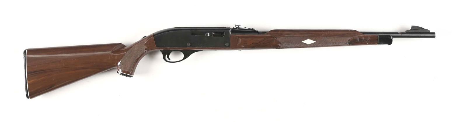 (M) REMINGTON NYLON 66 SEMI-AUTOMATIC RIFLE.: Mohawk brown nylon stock, sporting sights, grip cap with "Nylon 66", black plastic butt plate, black forend tip, white plastic diamonds on sides, blue finish. CONDITION. Good, with scattered scratches