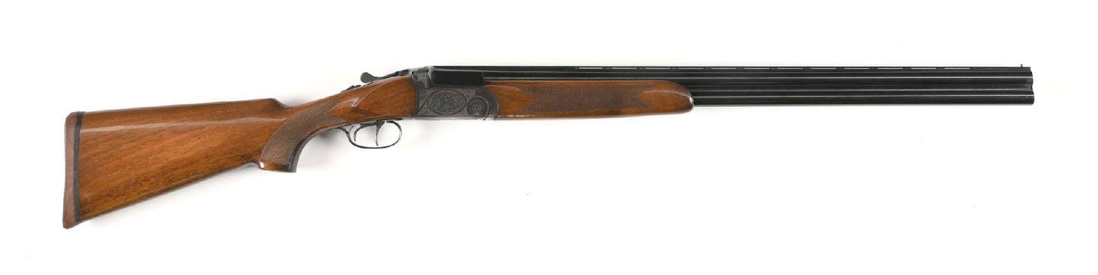 (M) SEARS AND ROEBUCK MODEL 281 12 GAUGE OVER UNDER SHOTGUN MADE BY ANTONIO ZOLI.: Made by Antonio Zoli for Sears and Roebuck. Blued barrels with a low rise serrated vent rib with a single bead front sight, blued engraved receiver, checkered beavertail forend with a Deely release, a