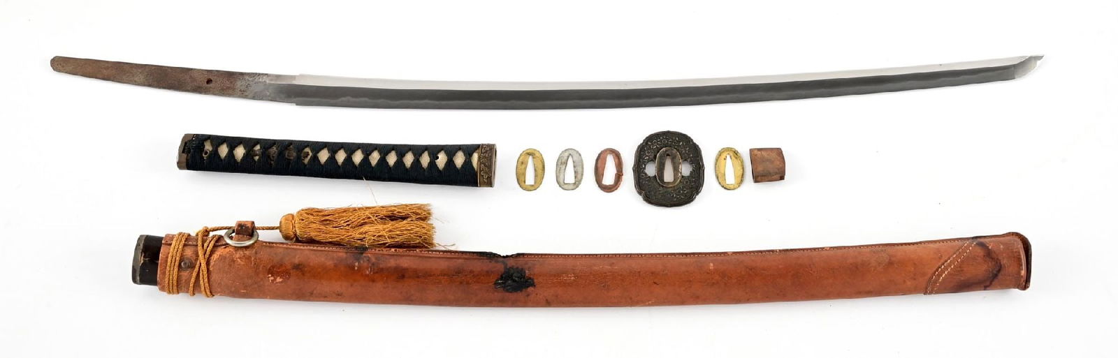 GENDAITO IN KOSHIRAE, SIGNED SHINODA UJIFUSA.: 65.8cm nagasa of shinogi zukuri form. Tight gunome midare temper line with a ko maru boshi. Copper habaki. Nakago with Sekiu stamp, kesho yasurime (filemarks), kurijiri, and signed "Shinoda Ujifusa".