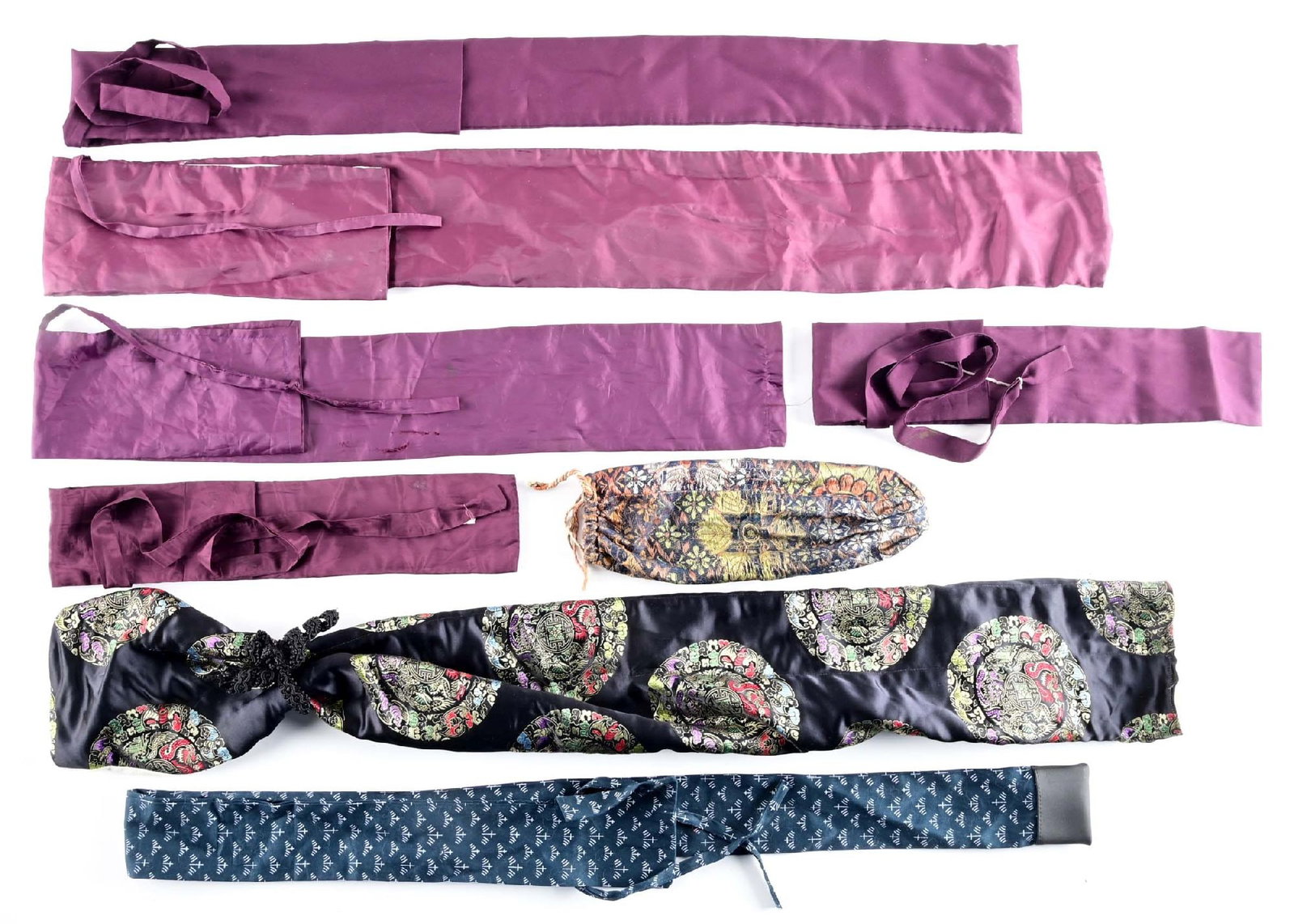 LARGE LOT OF SWORD BAGS: Lot consists of 16 mixed dimension and mixed color pattern sword protective bag; see photo. CONDITION: Very Good. Blade Length: N/A Overall Length: N/A