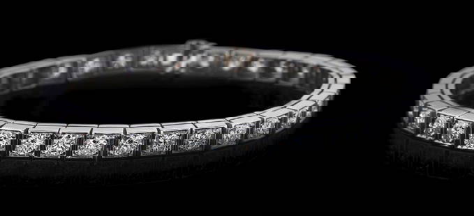 PLATINUM 5.50CT DIAMOND LINE BRACELET.: Ladies' platinum diamond line bracelet consisting of 34 round brilliant cut natural diamonds with a total weight of 5.50cts, graded G-H color, VS clarity. Bracelet measures 7" in length when clasped,