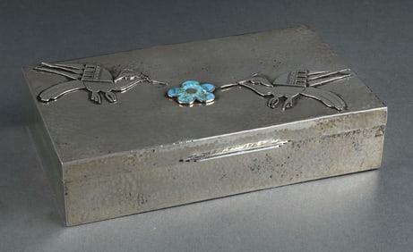 A PERUVIAN SILVER CIGAR BOX