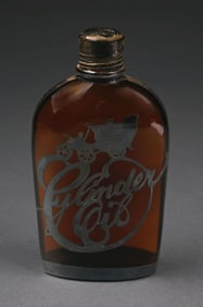 VINTAGE AMBER ADVERTISING BOTTLE