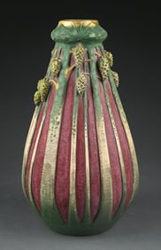 PAUL DACHSEL TALL GREEN PINECONE VASE ON RED BACKGROUND
