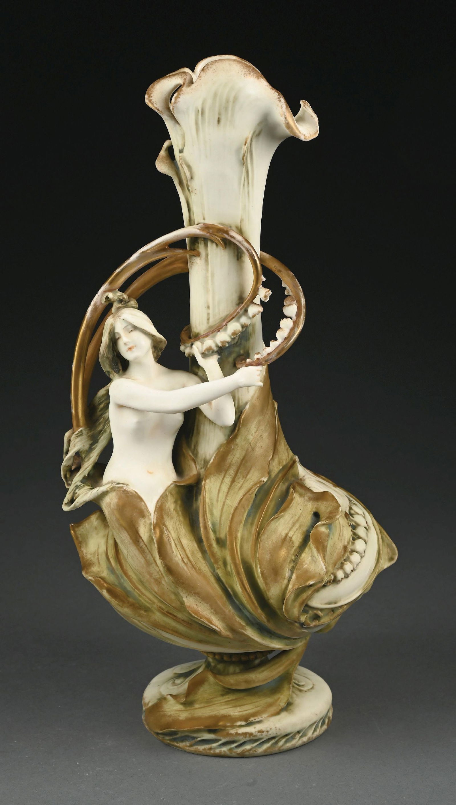AMPHORA PARIS EXPO 1900 LILY OF THE VALLEY VASE: Extremely well-sculpted. Beige, gold, and cream glazes with applied gold gilt. A great example of this model. Paris Expo 1900 mark, RSTK mark, marked "738" and "1." Literature Examples of this model S